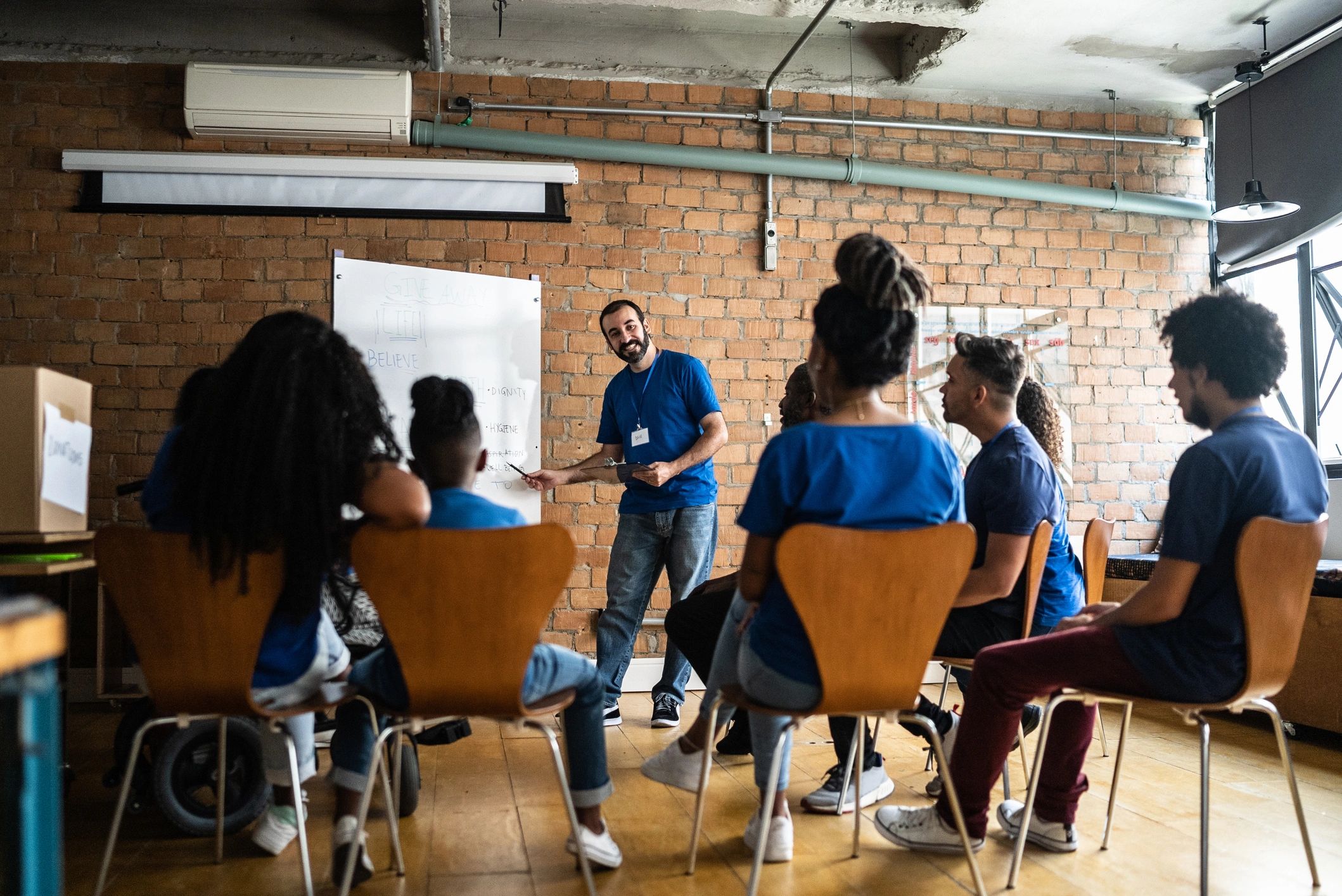 Community advocate speaking during a support meeting