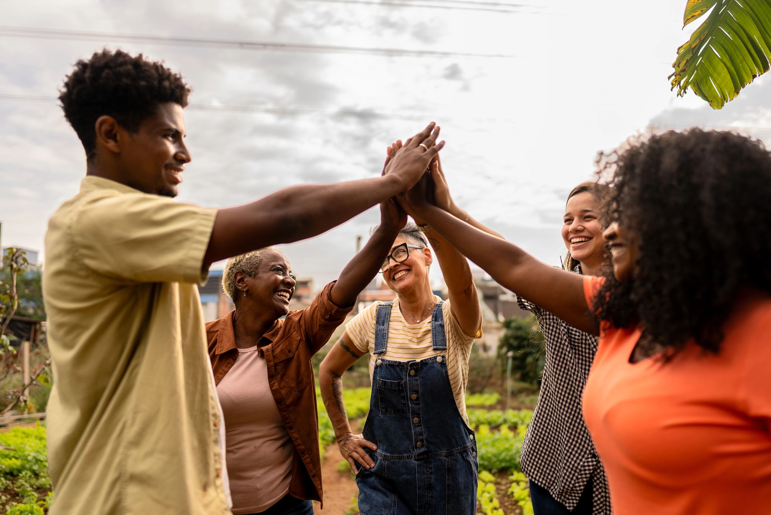 Community members working together in a garden